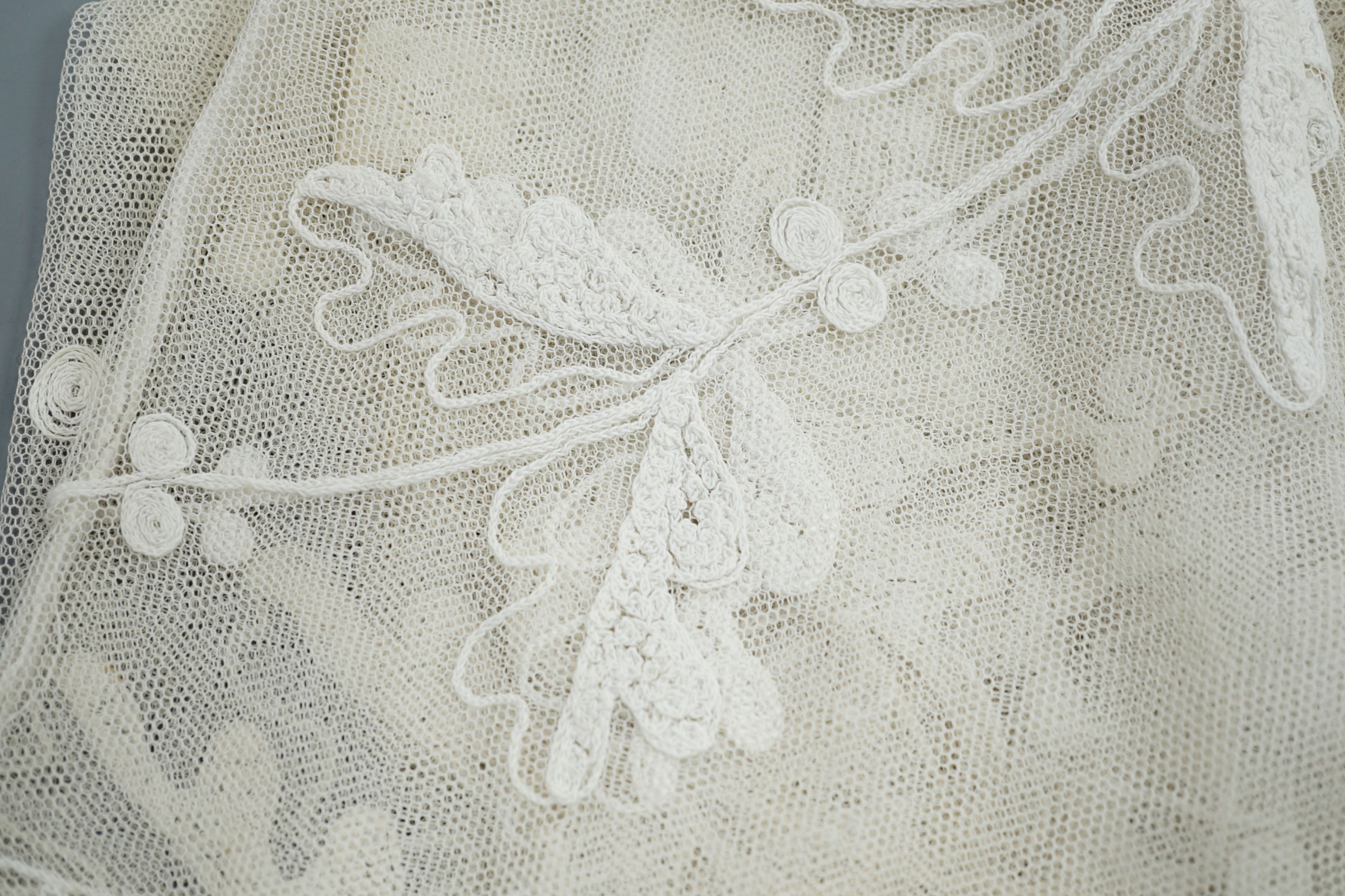 A needle lace skirt panel, a similar stole, various machine laces and trimmings